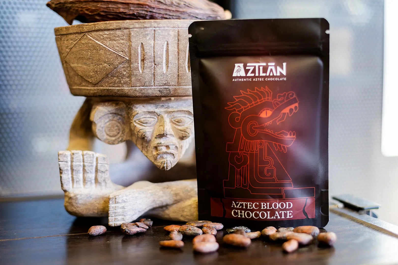 AztecBlood pouch with Aztec stone figurine and cacao beans